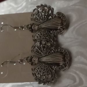 Angel earrings in silver tone with crystals.